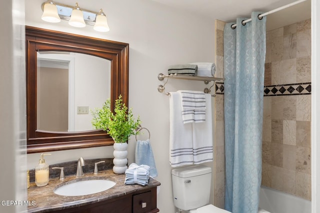 8820 Dirk Ct, El Paso, TX 79925 - bathroom featuring vanity and shower / bath combo with shower curtain