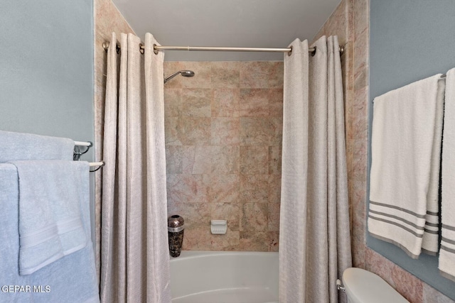 8820 Dirk Ct, El Paso, TX 79925 - full bathroom featuring shower / bath combo and toilet