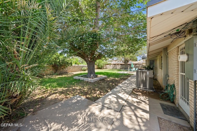 8820 Dirk Ct, El Paso, TX 79925 - fenced backyard with a patio area