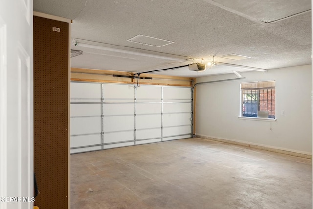 8820 Dirk Ct, El Paso, TX 79925 - garage featuring a garage door opener