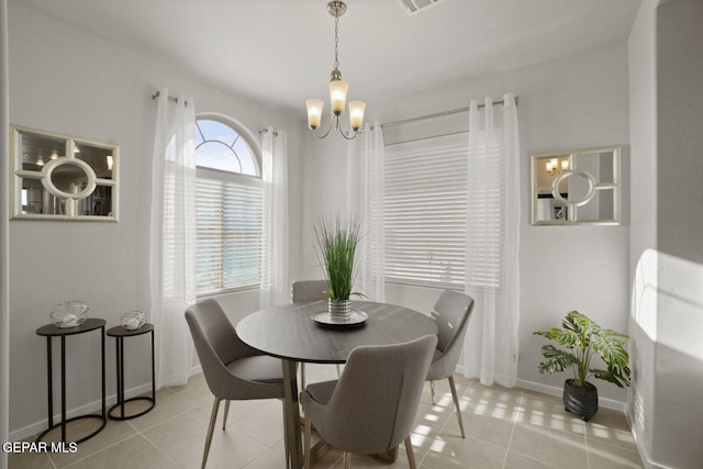916 Pettus Pl, El Paso, TX 79928 - dining room with a chandelier, baseboards, and light tile patterned floors