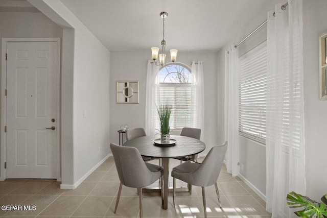 916 Pettus Pl, El Paso, TX 79928 - dining space with a chandelier, baseboards, and light tile patterned flooring