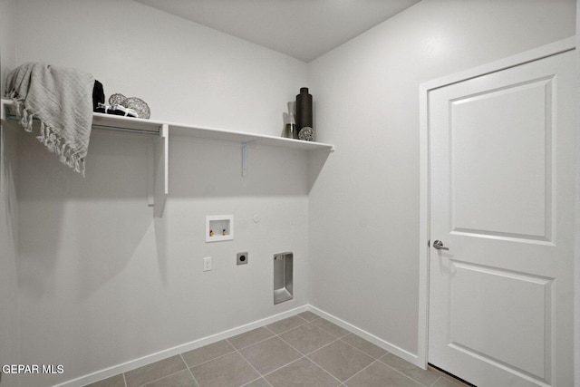 916 Pettus Pl, El Paso, TX 79928 - washroom with electric dryer hookup, washer hookup, hookup for a gas dryer, baseboards, and tile patterned floors