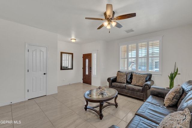 2201 Morning Mist Pl, El Paso, TX 79938 - living room with ceiling fan and light tile patterned floors