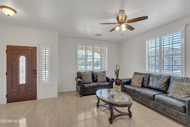 2201 Morning Mist Pl, El Paso, TX 79938 - tiled living area featuring ceiling fan and baseboards
