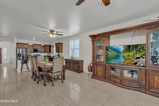 2201 Morning Mist Pl, El Paso, TX 79938 - dining area featuring ceiling fan and arched walkways