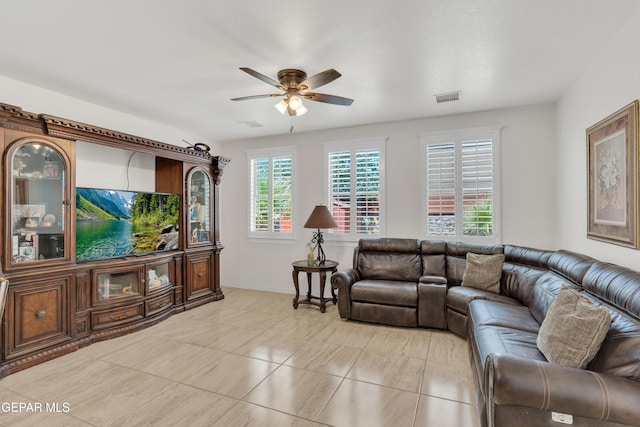 2201 Morning Mist Pl, El Paso, TX 79938 - living room featuring a ceiling fan, light tile patterned floors, and baseboards