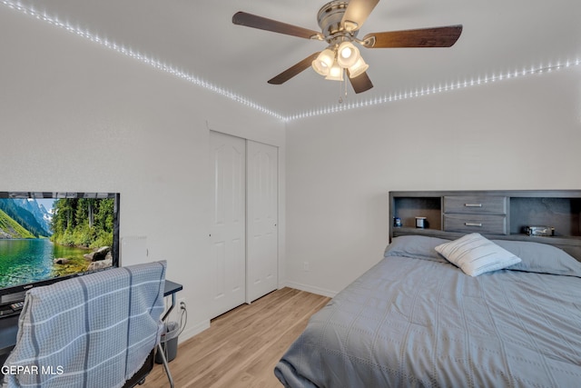 2201 Morning Mist Pl, El Paso, TX 79938 - bedroom with wood finished floors, baseboards, a ceiling fan, and a closet