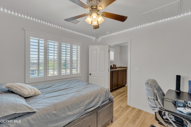 2201 Morning Mist Pl, El Paso, TX 79938 - bedroom with light wood-style floors, baseboards, and a ceiling fan