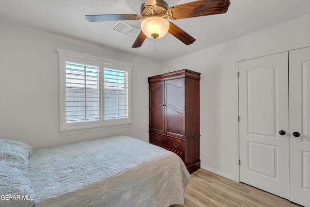 2201 Morning Mist Pl, El Paso, TX 79938 - bedroom with light wood finished floors, ceiling fan, and baseboards