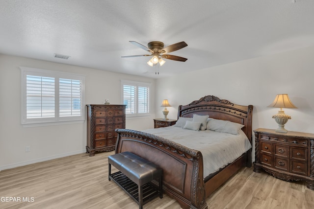 2201 Morning Mist Pl, El Paso, TX 79938 - bedroom with light wood finished floors, baseboards, and a ceiling fan