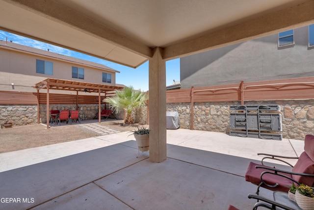 2201 Morning Mist Pl, El Paso, TX 79938 - fenced backyard featuring a pergola, a patio area, and outdoor dining space