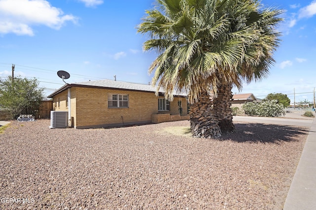 8108 Edgemere Blvd, El Paso, TX 79925 - view of front of property featuring brick siding and central AC unit