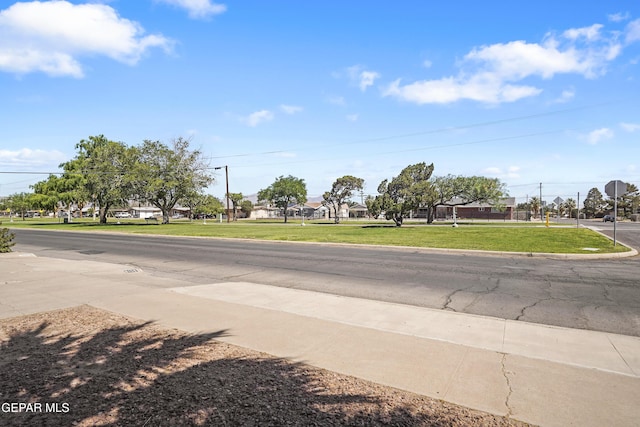 8108 Edgemere Blvd, El Paso, TX 79925 - view of asphalt road with curbs