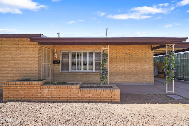 8108 Edgemere Blvd, El Paso, TX 79925 - entrance to property with brick siding