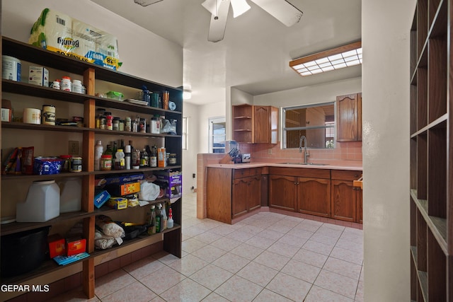 8108 Edgemere Blvd, El Paso, TX 79925 - kitchen with open shelves, a sink, decorative backsplash, light tile patterned floors, and light countertops