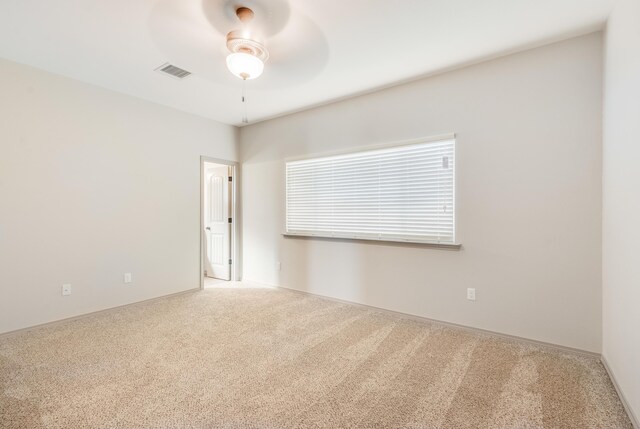 14294 Kayla Mia Dr, El Paso, TX 79938 - unfurnished room with carpet flooring, ceiling fan, and baseboards