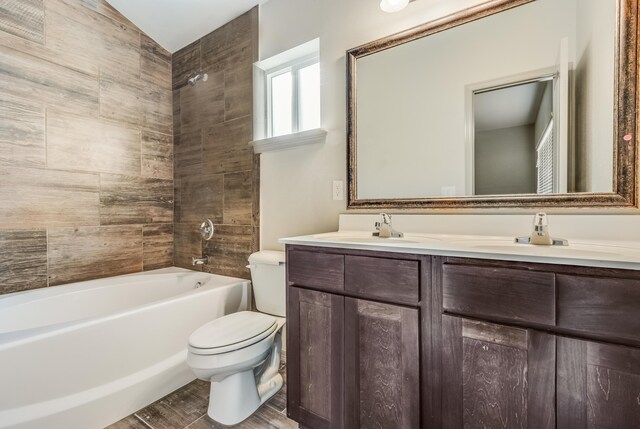 14294 Kayla Mia Dr, El Paso, TX 79938 - full bath featuring toilet, double vanity, and shower / tub combination