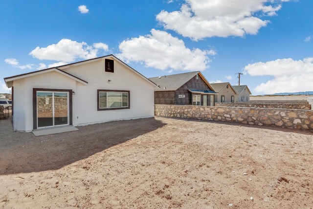 14294 Kayla Mia Dr, El Paso, TX 79938 - rear view of property with stucco siding