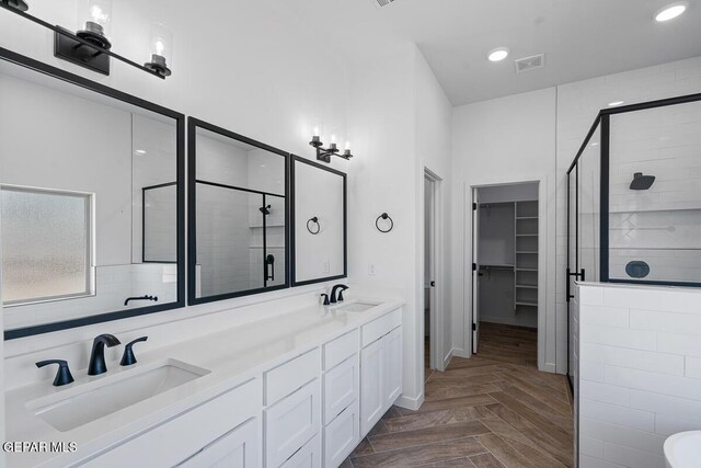 13797 Summer Wave Ave, El Paso, TX 79928 - full bath with a stall shower, double vanity, a spacious closet, and recessed lighting