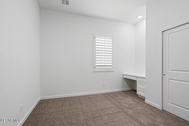 13797 Summer Wave Ave, El Paso, TX 79928 - unfurnished bedroom with light colored carpet, baseboards, and recessed lighting