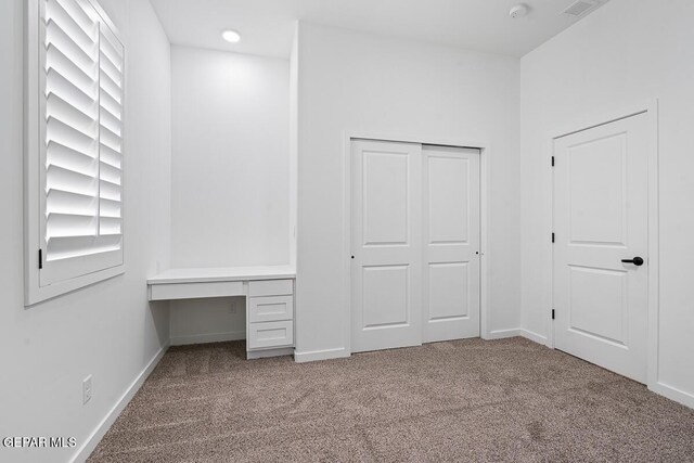 13797 Summer Wave Ave, El Paso, TX 79928 - unfurnished bedroom featuring carpet floors, baseboards, and a closet