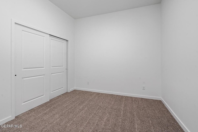 13797 Summer Wave Ave, El Paso, TX 79928 - unfurnished bedroom featuring carpet floors, baseboards, and a closet
