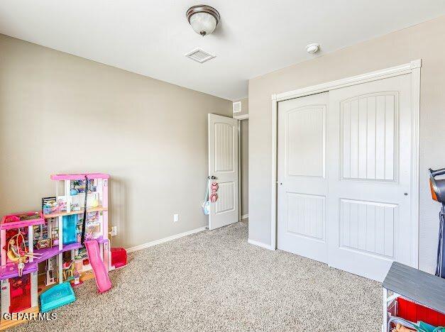 13649 Mill Hill Ct, El Paso, TX 79928 - playroom featuring carpet flooring and baseboards