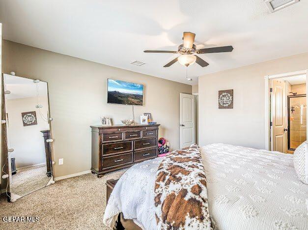 13649 Mill Hill Ct, El Paso, TX 79928 - bedroom with light carpet, a ceiling fan, and baseboards
