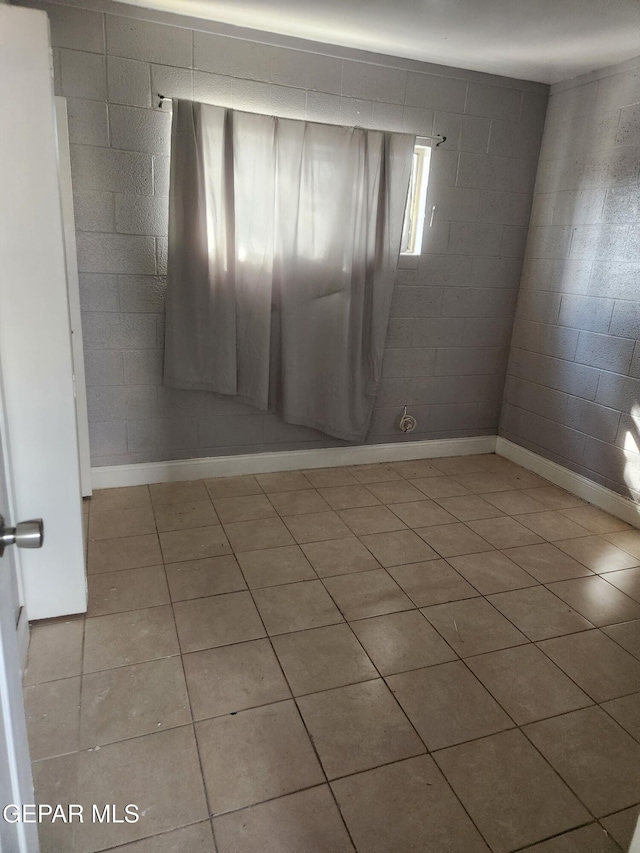 7511 Howard St, El Paso, TX 79904 - unfurnished room with light tile patterned floors