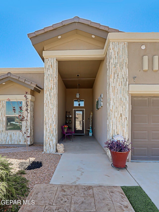 14701 Tim Hardaway, El Paso, TX 79938 - doorway to property with stucco siding