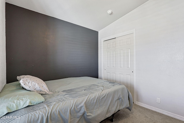 14701 Tim Hardaway, El Paso, TX 79938 - bedroom with carpet flooring, a closet, vaulted ceiling, and baseboards