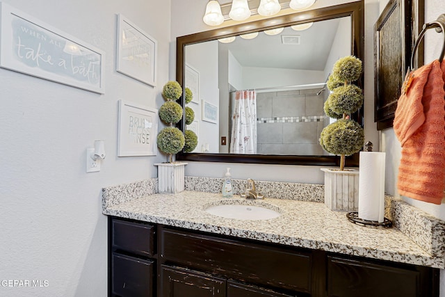 14701 Tim Hardaway, El Paso, TX 79938 - bathroom with vanity and curtained shower