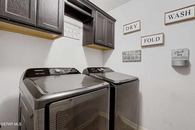14701 Tim Hardaway, El Paso, TX 79938 - laundry area featuring cabinet space and separate washer and dryer
