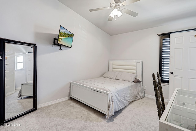 14701 Tim Hardaway, El Paso, TX 79938 - carpeted bedroom with baseboards and ceiling fan