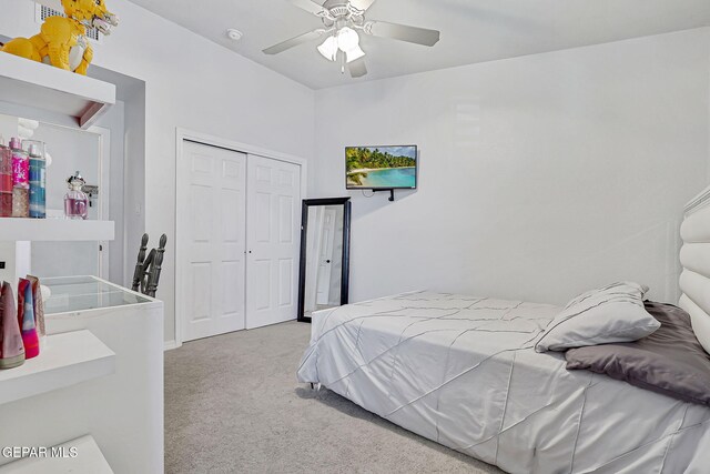 14701 Tim Hardaway, El Paso, TX 79938 - carpeted bedroom with a closet and a ceiling fan