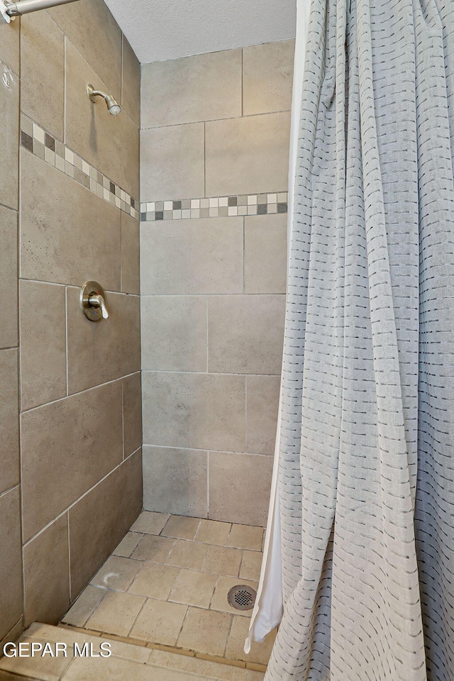 14701 Tim Hardaway, El Paso, TX 79938 - full bath featuring a tile shower