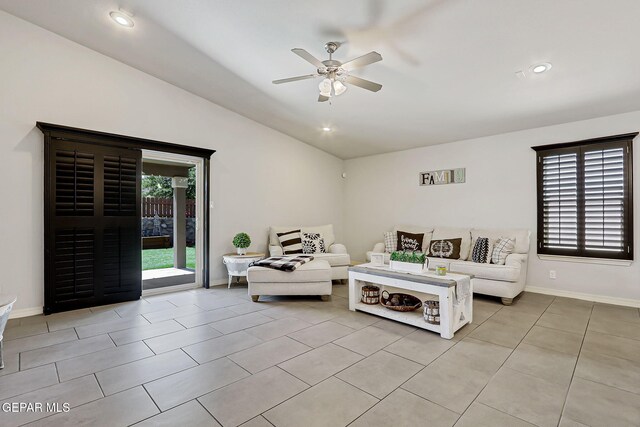 14701 Tim Hardaway, El Paso, TX 79938 - living area with a ceiling fan, vaulted ceiling, baseboards, light tile patterned floors, and recessed lighting
