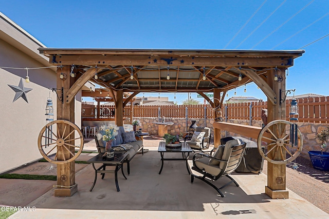 14701 Tim Hardaway, El Paso, TX 79938 - fenced backyard with a gazebo, a patio area, and outdoor lounge area