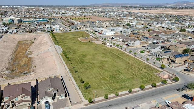 14701 Tim Hardaway, El Paso, TX 79938 - aerial view of property and surrounding area with mountains and nearby suburban area
