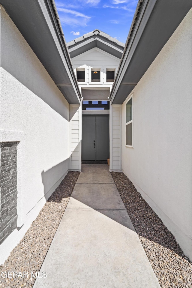12264 Clifton Hill Rd, El Paso, TX 79928 - entrance to property featuring a patio and stucco siding