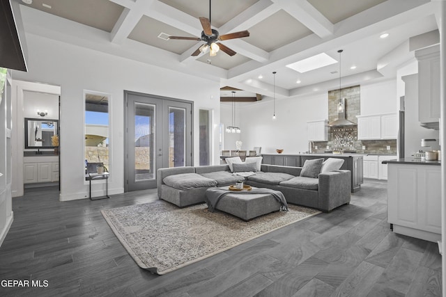 12264 Clifton Hill Rd, El Paso, TX 79928 - living room with coffered ceiling, a ceiling fan, beamed ceiling, recessed lighting, and a skylight