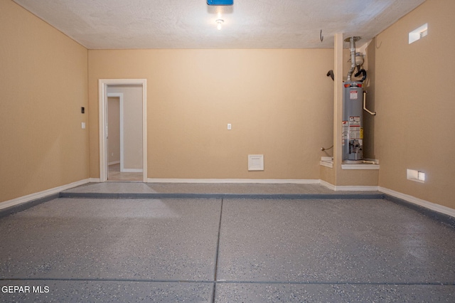 117 Camino Cresta Pl, Horizon City, TX 79928 - garage with water heater and baseboards