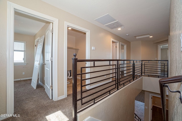 117 Camino Cresta Pl, Horizon City, TX 79928 - hall featuring an upstairs landing, carpet, and baseboards