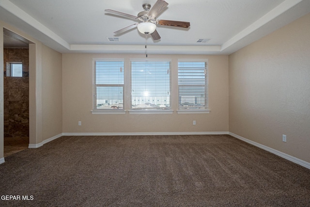 117 Camino Cresta Pl, Horizon City, TX 79928 - carpeted spare room featuring ceiling fan, a tray ceiling, and baseboards