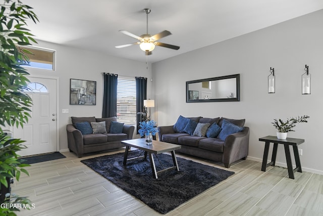 13142 Emerald Isle St, El Paso, TX 79928 - living area with wood tiled floors and a ceiling fan