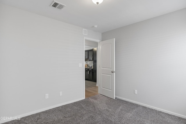 13142 Emerald Isle St, El Paso, TX 79928 - unfurnished room with light colored carpet and baseboards
