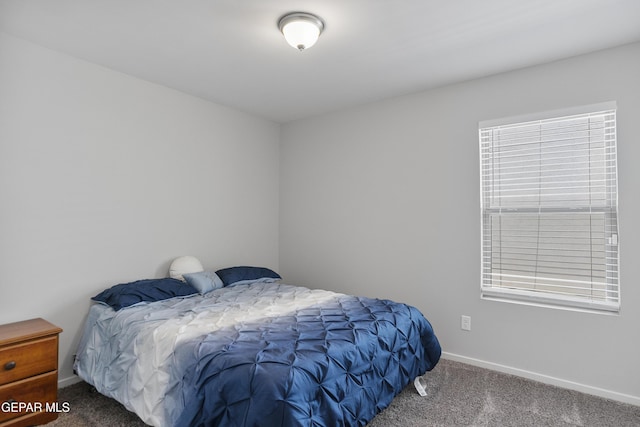13142 Emerald Isle St, El Paso, TX 79928 - carpeted bedroom featuring baseboards
