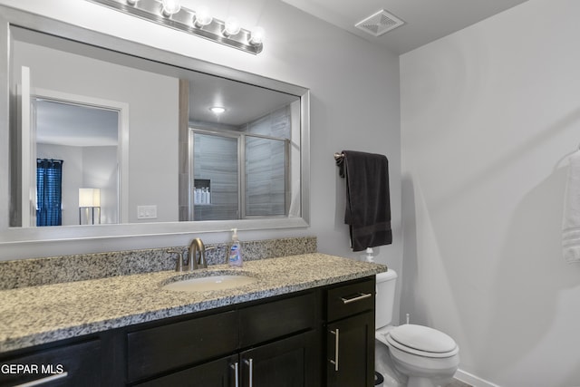 13142 Emerald Isle St, El Paso, TX 79928 - bathroom featuring vanity and an enclosed shower
