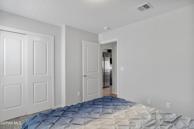 13142 Emerald Isle St, El Paso, TX 79928 - bedroom featuring freestanding refrigerator and a closet